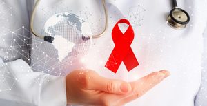 Die globale HIV-Versorgung befindet sich in einer Finanzierungskrise – mit potenziell verheerenden Folgen. Der Umbruch bietet aber auch eine Chance, findet Pharma Fakten-Redakteurin Alina Massari. Foto: ©iStock.com/Natali_Mis